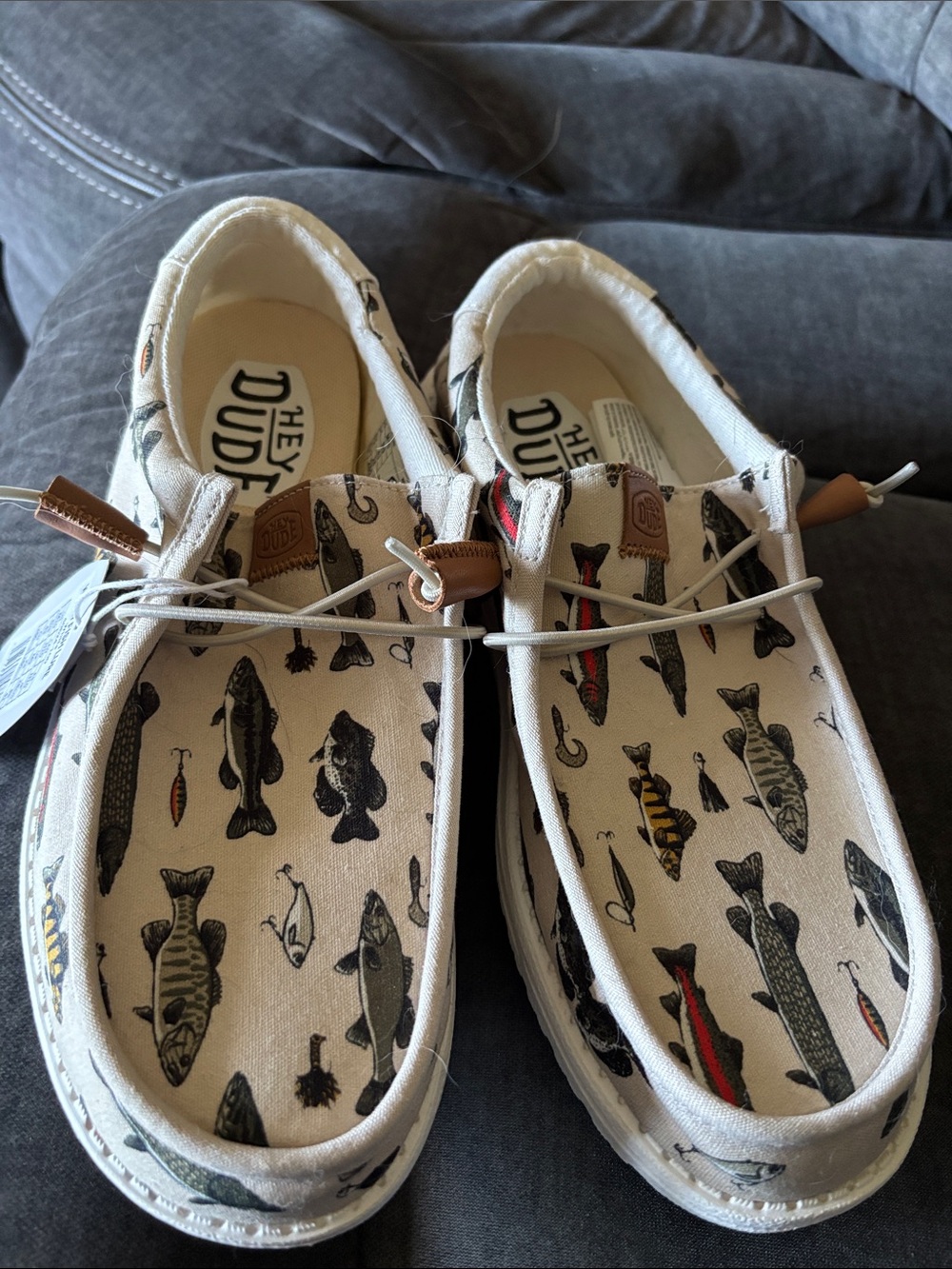 Hey Dude Men's Canvas Slip-Ons in Cream with Multi-Colored Fish Print